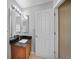 This bathroom features a single sink vanity with a granite countertop at 26100 Paysandu Dr, Punta Gorda, FL 33983