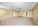 Large bedroom with wood-look flooring and a ceiling fan at 26100 Paysandu Dr, Punta Gorda, FL 33983