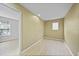 Cozy bedroom showcasing wood-look flooring and ample natural light at 26100 Paysandu Dr, Punta Gorda, FL 33983