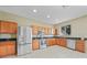 Spacious kitchen with stainless steel appliances, granite counters, and modern cabinetry at 26100 Paysandu Dr, Punta Gorda, FL 33983