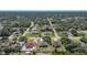 Aerial view of the neighborhood, showing houses with large yards and mature trees at 2751 S Cranberry Blvd, North Port, FL 34286