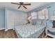 Cozy bedroom with coastal decor, ceiling fan, and closet at 318 Spring Lake Nw Blvd, Port Charlotte, FL 33952