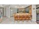 Eat-in kitchen featuring a center island with seating and bright countertops at 318 Spring Lake Nw Blvd, Port Charlotte, FL 33952