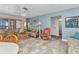 Comfortable living room with charming decor, plenty of seating, and an open layout at 318 Spring Lake Nw Blvd, Port Charlotte, FL 33952