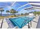 Screened in outdoor pool and waterfront views at 318 Spring Lake Nw Blvd, Port Charlotte, FL 33952