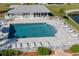 Gorgeous community pool with plenty of seating, a clean layout, and inviting atmosphere at 3310 Loveland Blvd # 1503, Punta Gorda, FL 33980