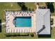 Aerial shot of the refreshing community pool with ample seating and well-maintained surroundings at 3310 Loveland Blvd # 1503, Punta Gorda, FL 33980