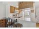 Well-lit kitchen area featuring a breakfast bar and bright lighting, ideal for dining at 3310 Loveland Blvd # 1503, Punta Gorda, FL 33980
