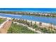 Scenic aerial view of a beach community with lush greenery and waterfront access at 3319 Shamrock Dr, Venice, FL 34293