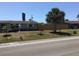 Charming single-story home with a well-maintained lawn and mature palm trees at 3319 Shamrock Dr, Venice, FL 34293