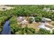 Expansive aerial view of property with tranquil river access and verdant surroundings at 3400 Allapatchee Dr, Punta Gorda, FL 33950