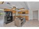 Well-equipped kitchen with wooden cabinets, stainless steel appliances, and a convenient center island at 3400 Allapatchee Dr, Punta Gorda, FL 33950