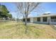 Large fenced backyard offering mature trees at 3515 Vasco St, Punta Gorda, FL 33950