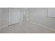Spacious bedroom featuring neutral paint, tile floors, and closet with easy access to adjacent rooms at 3515 Vasco St, Punta Gorda, FL 33950