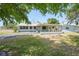 Charming single-story home featuring a covered porch and long driveway at 3515 Vasco St, Punta Gorda, FL 33950