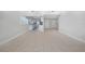 Spacious living area featuring tile floors and a view of the kitchen at 3515 Vasco St, Punta Gorda, FL 33950