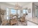 Dining room with chandelier and a view of the water at 43050 Greenway Blvd # 645, Punta Gorda, FL 33982