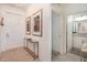 Bright entryway featuring neutral decor and access to a well-lit bathroom at 43050 Greenway Blvd # 645, Punta Gorda, FL 33982