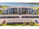 Beautiful aerial view of the condo complex with well-maintained landscaping and convenient parking at 43050 Greenway Blvd # 645, Punta Gorda, FL 33982