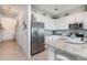 Stylish kitchen with stainless steel appliances, granite countertops, and ample cabinet space at 43050 Greenway Blvd # 645, Punta Gorda, FL 33982