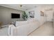 Modern living room with a plush sofa, TV, and stylish decor at 43050 Greenway Blvd # 645, Punta Gorda, FL 33982