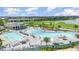 A luxury swimming pool and lounge area are available in this community, surrounded by lush landscaping and golf course views at 43050 Greenway Blvd # 645, Punta Gorda, FL 33982