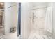 A community shower and changing area features tiled walls, a bench, and modern fixtures for convenience at 43050 Greenway Blvd # 645, Punta Gorda, FL 33982