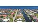Coastal community featuring waterfront homes with canal access, docks, and stunning ocean views at 48 Hibiscus Dr, Punta Gorda, FL 33950