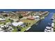 An aerial view of a waterfront home with a private dock and swimming pool at 48 Hibiscus Dr, Punta Gorda, FL 33950