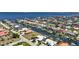 Waterfront community featuring stunning canal views, lush landscaping, and private boat docks for easy access to the open water at 48 Hibiscus Dr, Punta Gorda, FL 33950