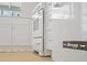 Close up of the classic white stove and fridge with chrome handles at 48 Hibiscus Dr, Punta Gorda, FL 33950