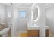 Modern bathroom with clean lines, floating vanity, and an LED mirror at 48 Hibiscus Dr, Punta Gorda, FL 33950