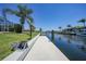 Concrete dock offers access to the canal and waterfront views at 48 Hibiscus Dr, Punta Gorda, FL 33950