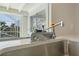 Dishmaster Imperial Four faucet with a view of the water through sliding glass doors at 48 Hibiscus Dr, Punta Gorda, FL 33950