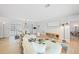 A bright living room with neutral tones, wood floors and plenty of seating at 48 Hibiscus Dr, Punta Gorda, FL 33950