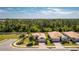Inviting single-story homes with well-manicured lawns, paver driveways and lush palm trees create a serene neighborhood at 4992 Brittain Way, North Port, FL 34287