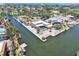 Beautiful waterfront property with a private pool and dock, providing direct access to the bay for boating and recreation at 5181 Sandy Shore Ave, Sarasota, FL 34242