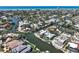 Luxury waterfront living, showcasing stunning canal views and convenient access to the ocean for boating enthusiasts at 5181 Sandy Shore Ave, Sarasota, FL 34242