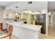 Bright kitchen features white countertops, and ample cabinet space at 5181 Sandy Shore Ave, Sarasota, FL 34242