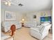Inviting living room with neutral tones, plush seating, and serene decor at 5181 Sandy Shore Ave, Sarasota, FL 34242