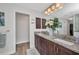 This bathroom features a double vanity with granite countertops and storage at 526 Allen St, Punta Gorda, FL 33950