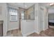 Walk-in shower features tile and updated fixtures at 526 Allen St, Punta Gorda, FL 33950