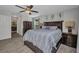 This bedroom features a ceiling fan and an ensuite bathroom at 526 Allen St, Punta Gorda, FL 33950