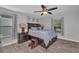 This bedroom boasts a ceiling fan and lots of natural light at 526 Allen St, Punta Gorda, FL 33950