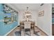Well-lit dining area with stylish table, comfortable seating, and beachy decor at 526 Allen St, Punta Gorda, FL 33950