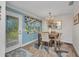 Bright dining room with modern table, chandelier, and stylish decor at 526 Allen St, Punta Gorda, FL 33950