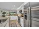 Updated kitchen with stainless steel appliances and granite countertops at 526 Allen St, Punta Gorda, FL 33950