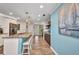 This kitchen offers granite countertops and stainless steel appliances with lots of seating at the breakfast bar at 526 Allen St, Punta Gorda, FL 33950
