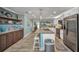 Spacious kitchen with island seating, stainless steel appliances, and modern finishes at 526 Allen St, Punta Gorda, FL 33950