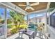 Relaxing screened porch with comfortable seating and serene outdoor views at 526 Allen St, Punta Gorda, FL 33950